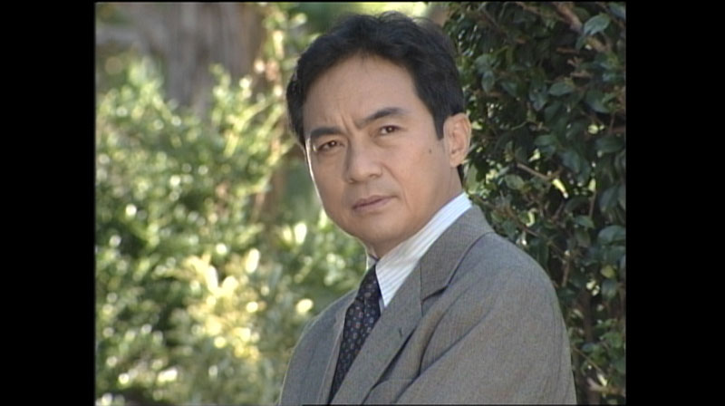 警部補　佃次郎